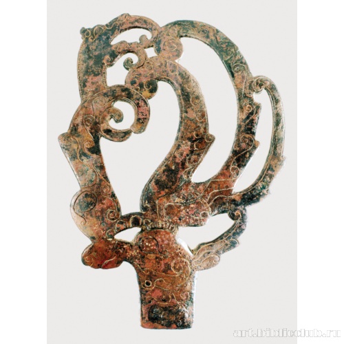 Навершие в виде головы оленя с рогами, содержащими полиморфные образы