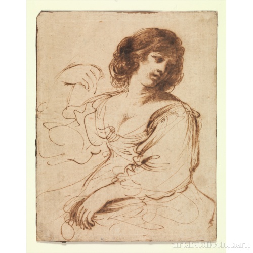 Сидящая молодая женщина, оглядывающаяся через плечо